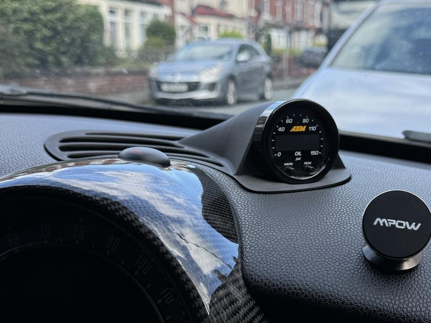 3D-printed gauge pod for a Mini (installed)